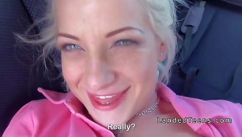 Sexy blonde plays with her black dildo